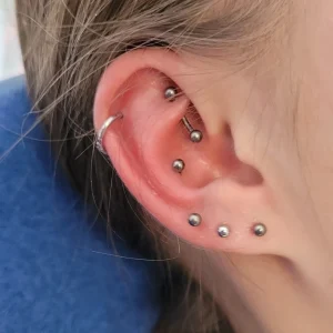 Nordik Piercing: Piercings lobe, piercing conch, piercing helix et piercing rook