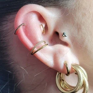 Nordik Piercing: piercing tragus, piercing rook, piercing helix et piercing conch