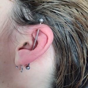 Nordik Piercing: Piercing lobe transversal